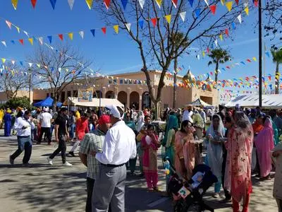 Community members walking in the Nagar Kirtan procession