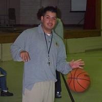 Coach dribbling with players